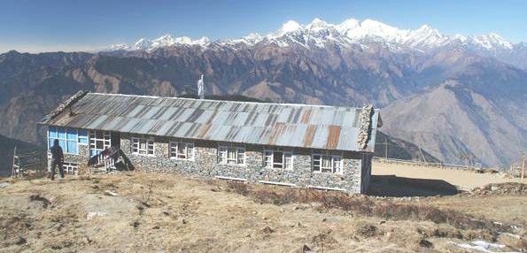 Snow capped peaks of the Himalayas viewed from Hotel Mount Rest Laurebina
